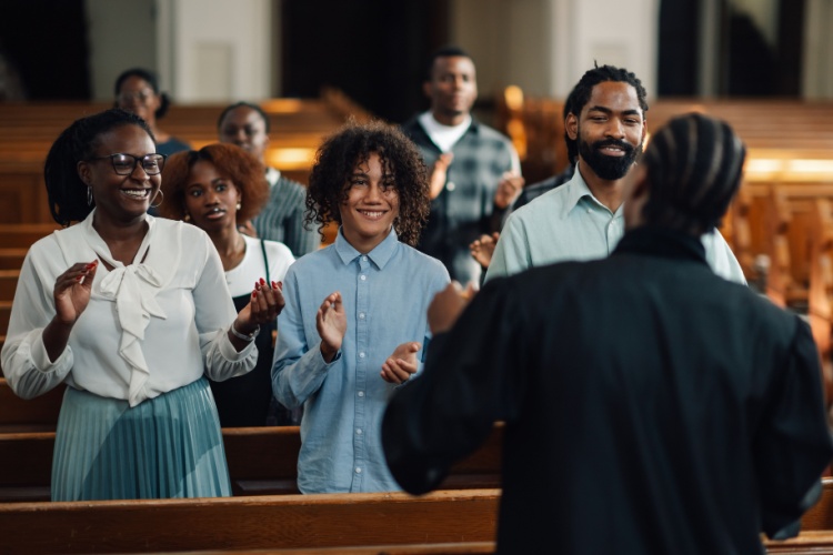 Happy group of people in a church service